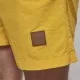 Мъжки плувни шорти Urban Classics Block в жълт цвят, Къси панталони - Hoodstyle.bg