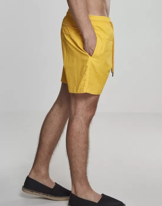 Мъжки плувни шорти Urban Classics Block в жълт цвят, Къси панталони - Hoodstyle.bg