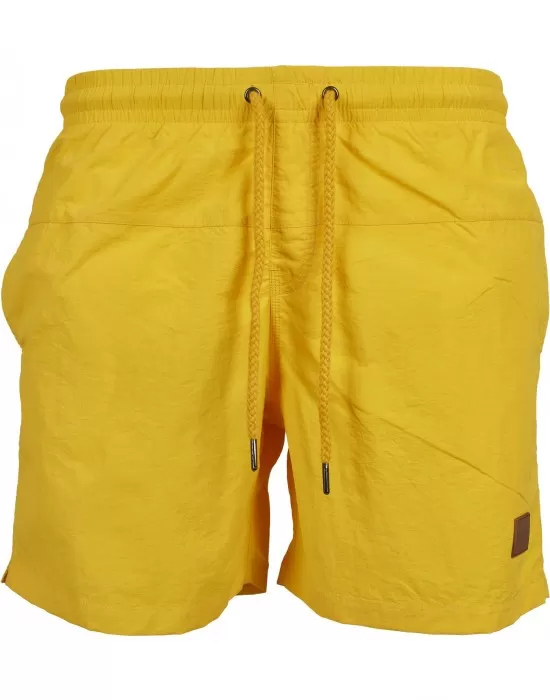 Мъжки плувни шорти Urban Classics Block в жълт цвят, Къси панталони - Hoodstyle.bg