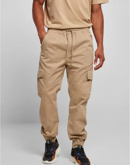 Мъжки панталон в бежов цвят Urban Classics Military Jogg, Панталони - Hoodstyle.bg