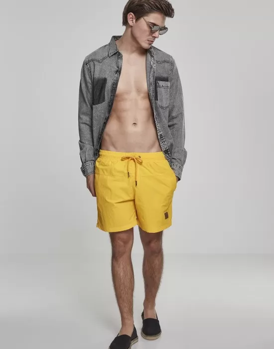 Мъжки плувни шорти Urban Classics Block в жълт цвят, Къси панталони - Hoodstyle.bg