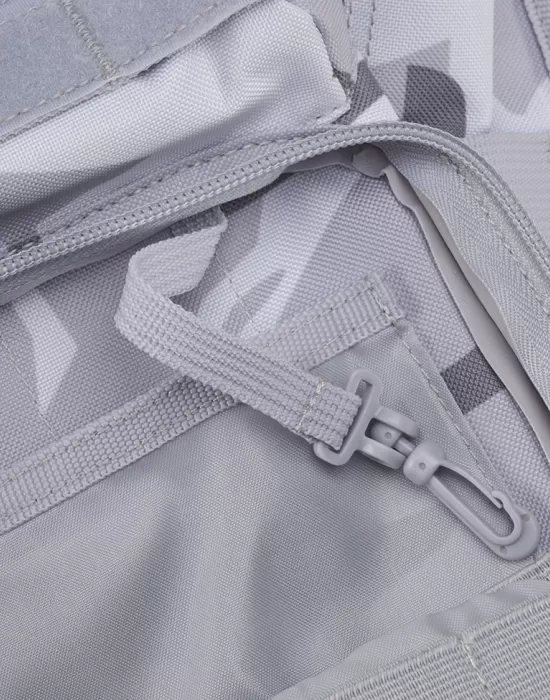 Функционална чанта в сив камуфлаж Brandit US Cooper Sling Pack Medium blizzard camo, Чанти - Hoodstyle.bg